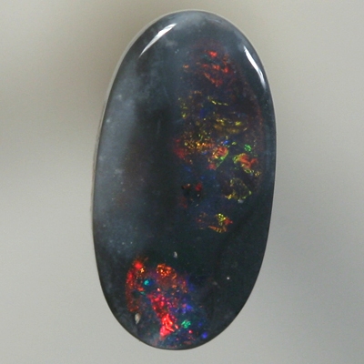 SOLID BLACK OPAL Sparkles of red and orange between black opal